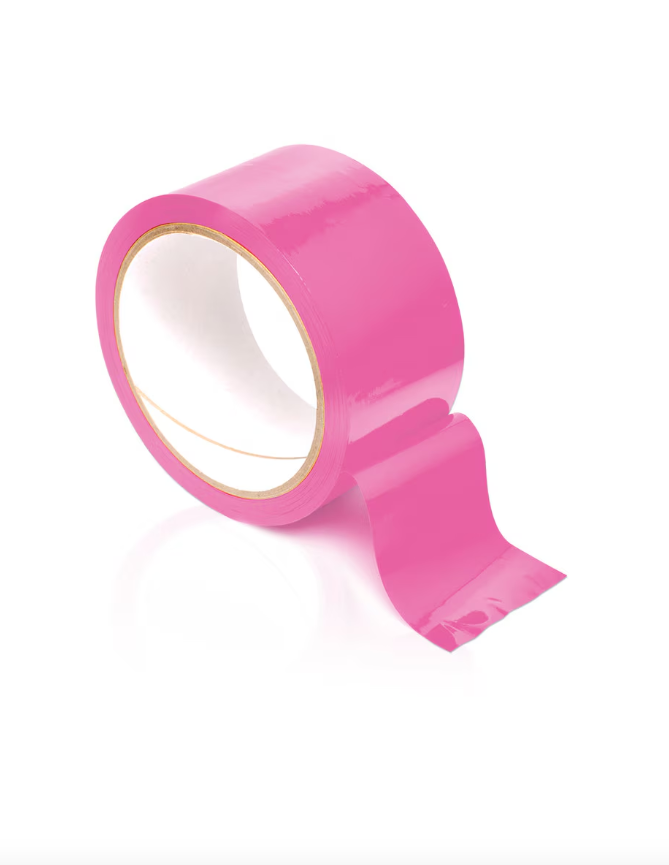 Roll of Fetish Fantasy Pleasure Tape Pink displayed on white background