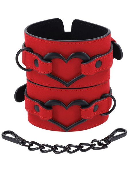 Pair of Sex and Mischief Amor Handcuffs stacked together highlighting red vegan leather and black chain