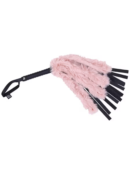 Sex and Mischief Brat Faux Fur Flogger with blush pink faux fur tails and black handle shown at an angle