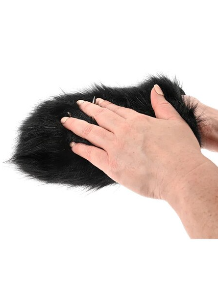 Spiked Sensory Mitt shown in hand with soft faux fur side facing out